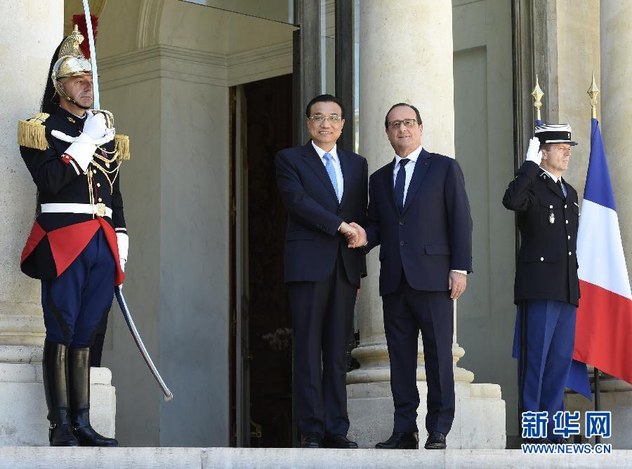 当地时间6月30日下午，国务院总理李克强在巴黎爱丽舍宫会见法国总统奥朗德。 新华社记者李学仁摄