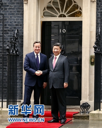 10月21日，国家主席习近平在伦敦唐宁街首相府同英国首相卡梅伦举行会谈。 新华社记者 鞠鹏 摄 